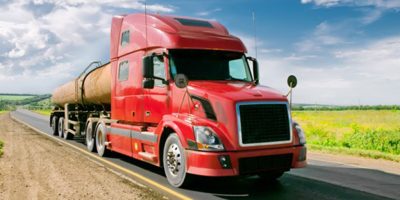 red semi truck in supply chain management